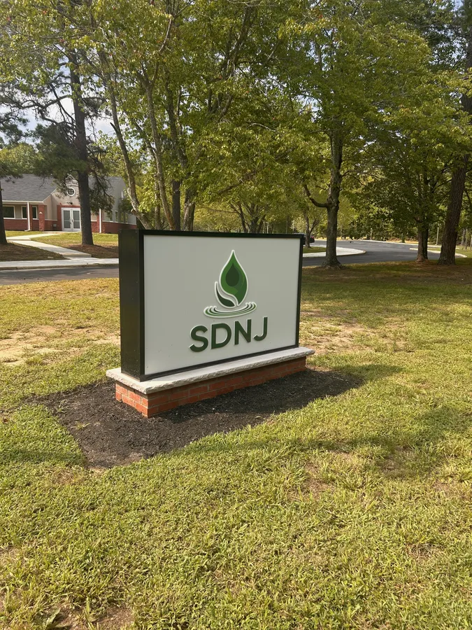 SDNJ sign at the entrance to Still Detox New Jersey in Mays Landing