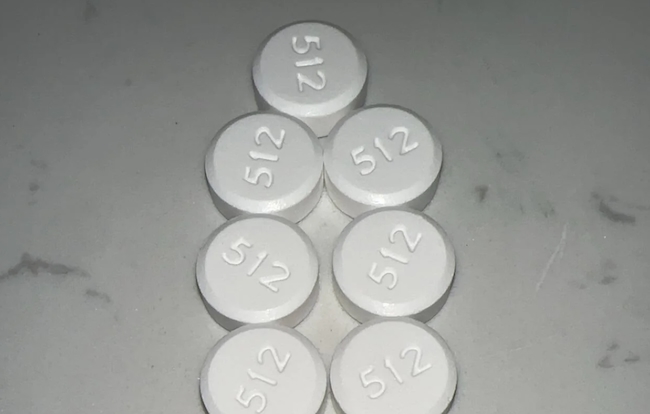 512 white round pill