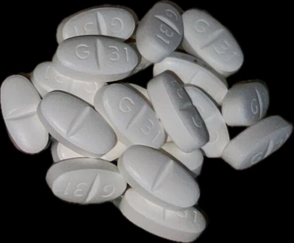 g 31 white oval pill