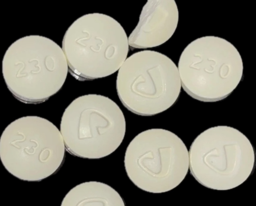 yellow round 230 pill