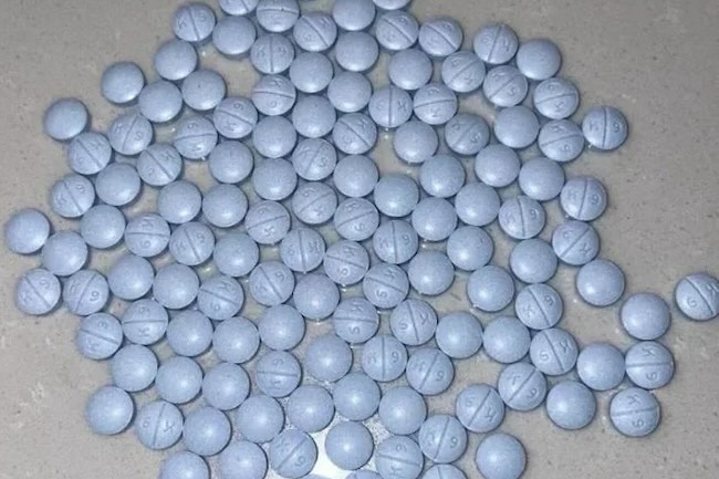 k9 blue round pill